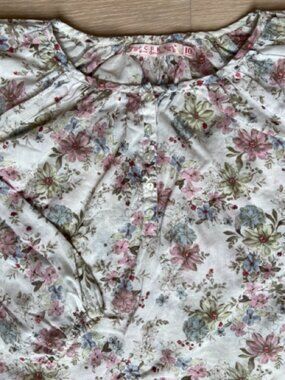 C.F.K, Pastel floral print on white background pop over Kids blouse, size 10 yrs